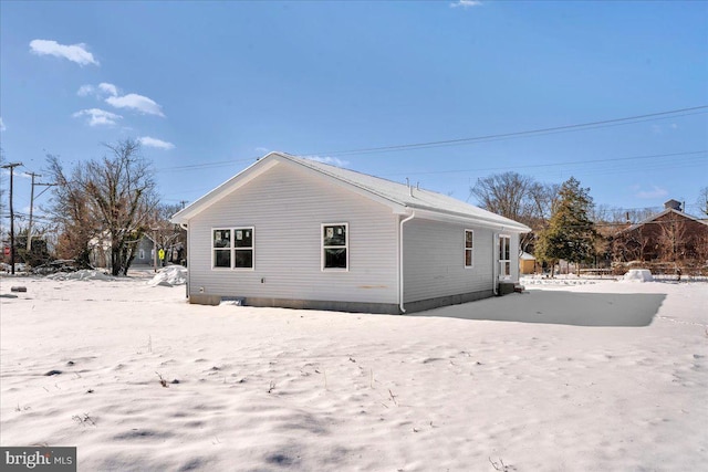 view of snow covered property