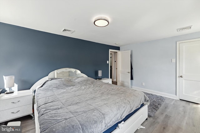 bedroom featuring light hardwood / wood-style floors