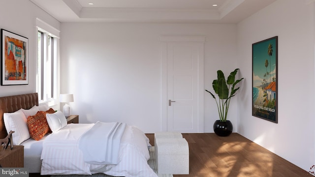 bedroom featuring ornamental molding and a tray ceiling