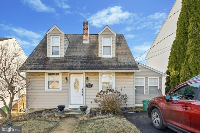 view of new england style home