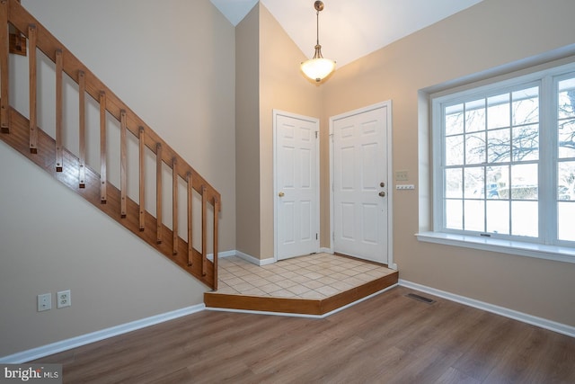 foyer with light wood-type flooring