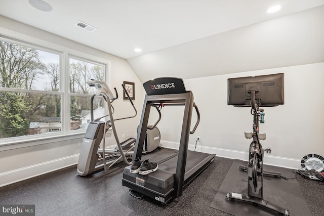 exercise area with lofted ceiling