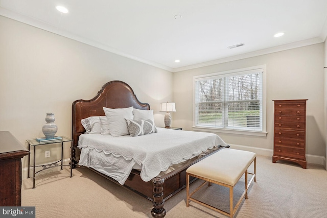 bedroom with light colored carpet and ornamental molding