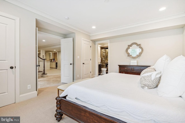 carpeted bedroom featuring crown molding