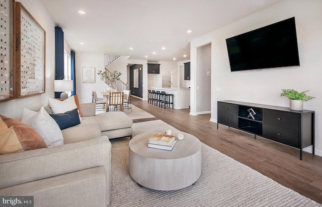 living room with hardwood / wood-style floors