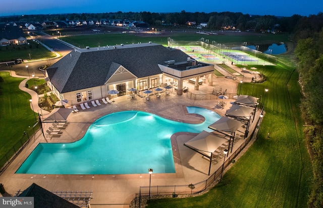 view of swimming pool with a patio area