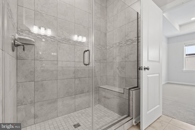 bathroom featuring tile patterned floors and walk in shower