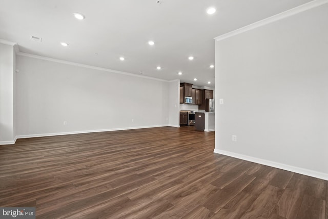 unfurnished living room with dark hardwood / wood-style floors and crown molding