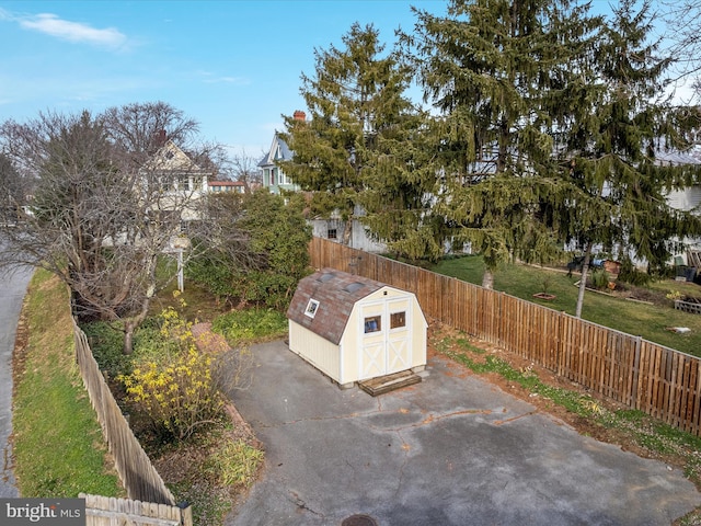 view of patio / terrace with a storage unit