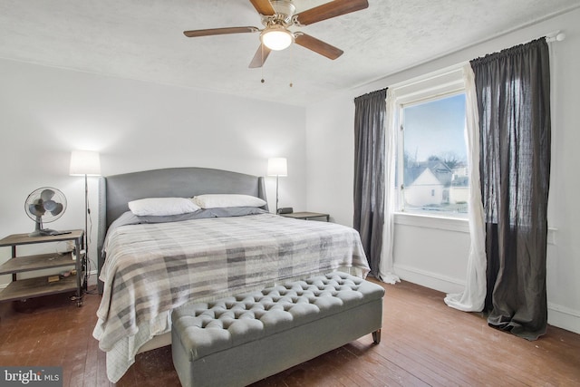 bedroom featuring ceiling fan and hardwood / wood-style floors