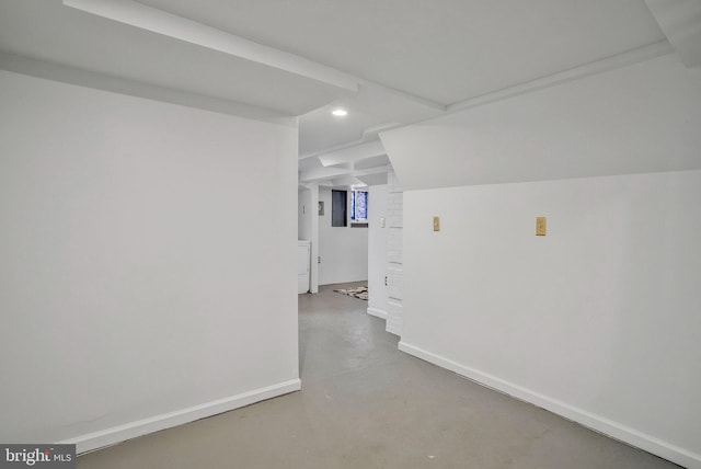 interior space featuring washer / dryer and concrete floors