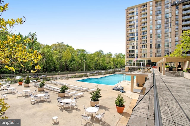 view of pool featuring a patio area