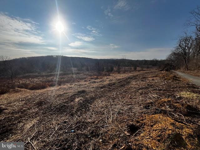 view of mountain feature with a rural view