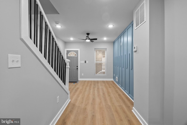 entrance foyer featuring ceiling fan and light hardwood / wood-style floors