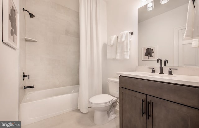 full bathroom with tile patterned floors, vanity, toilet, and shower / bath combo with shower curtain