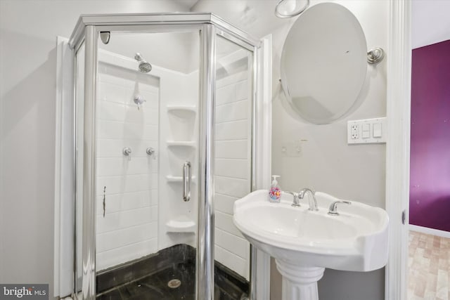 bathroom with an enclosed shower