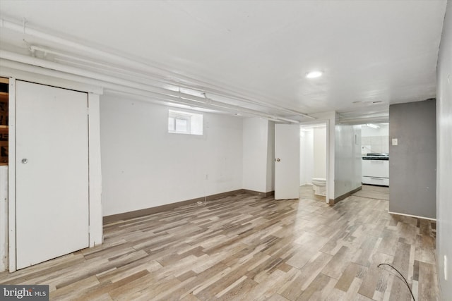 basement featuring light hardwood / wood-style floors