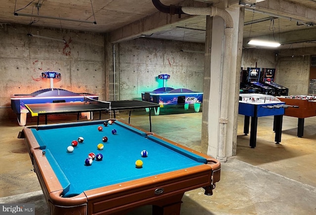 recreation room with concrete floors and billiards