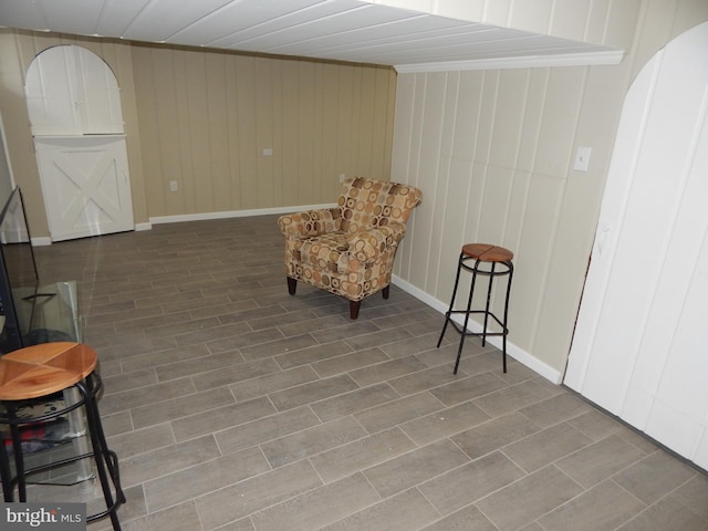 sitting room with wooden walls