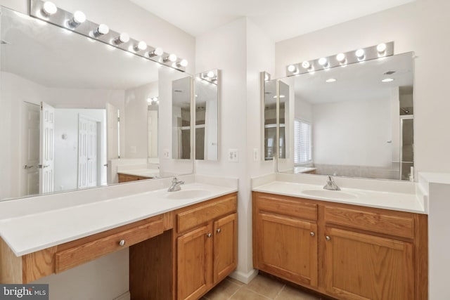 bathroom with tile patterned flooring and vanity