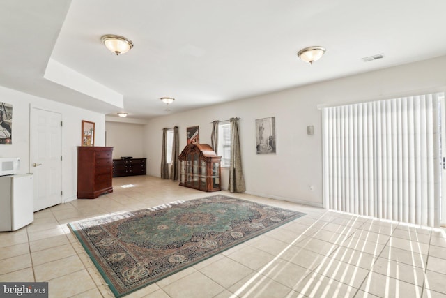 interior space with light tile patterned floors