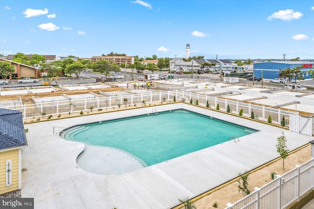 view of swimming pool featuring a patio area