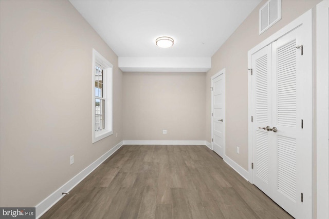 interior space featuring a closet and hardwood / wood-style floors