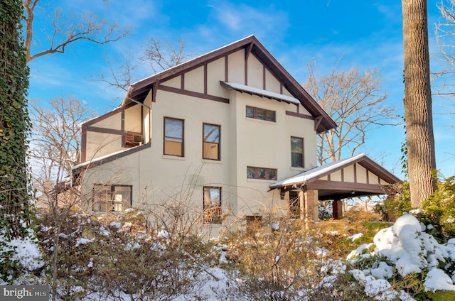 view of snow covered property