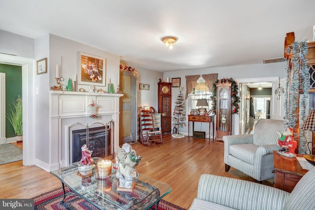 living room with light hardwood / wood-style floors