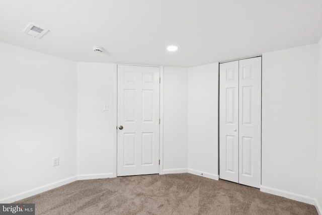 unfurnished bedroom featuring carpet floors