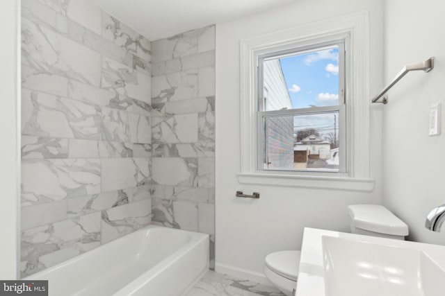 full bathroom featuring sink, shower / bathtub combination, and toilet