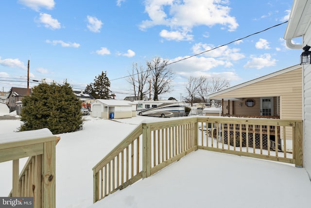 view of snow covered deck