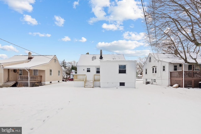 view of snow covered property