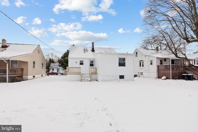 view of snow covered property