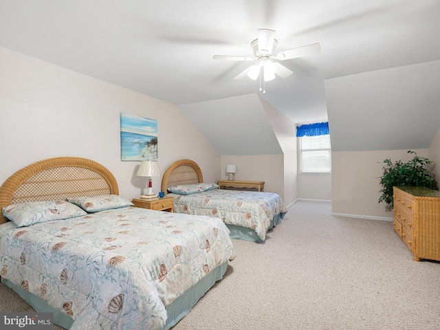 carpeted bedroom with ceiling fan and lofted ceiling