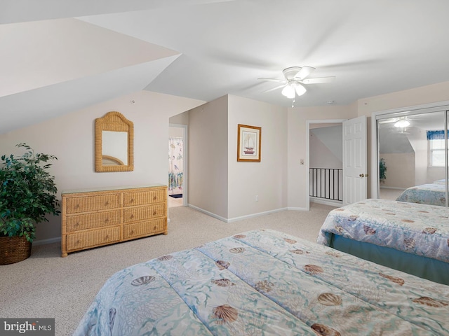 bedroom featuring ceiling fan and light colored carpet