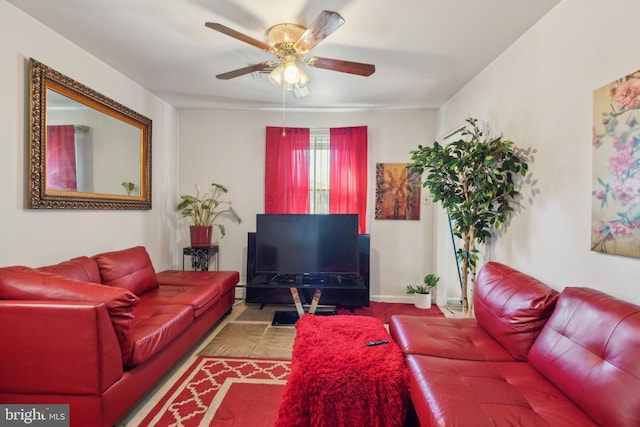 living room featuring ceiling fan