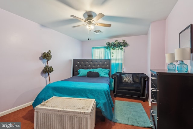 bedroom with ceiling fan and carpet