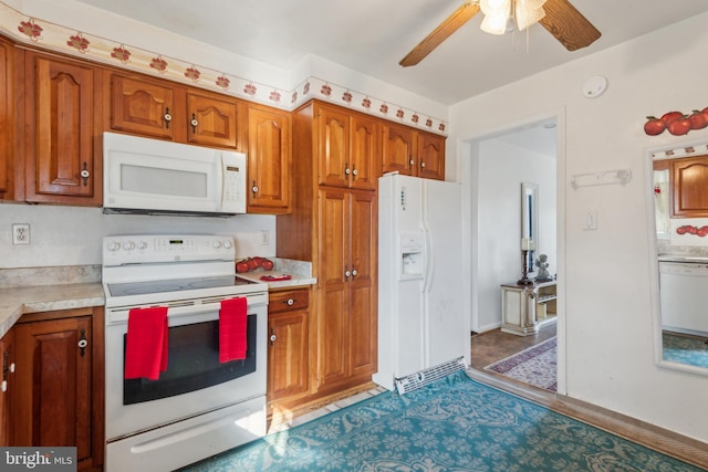 kitchen with ceiling fan and white appliances