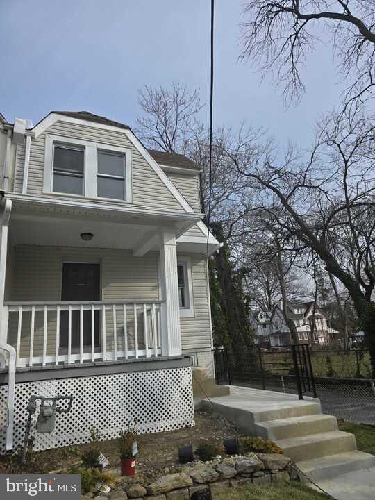 view of home's exterior featuring covered porch