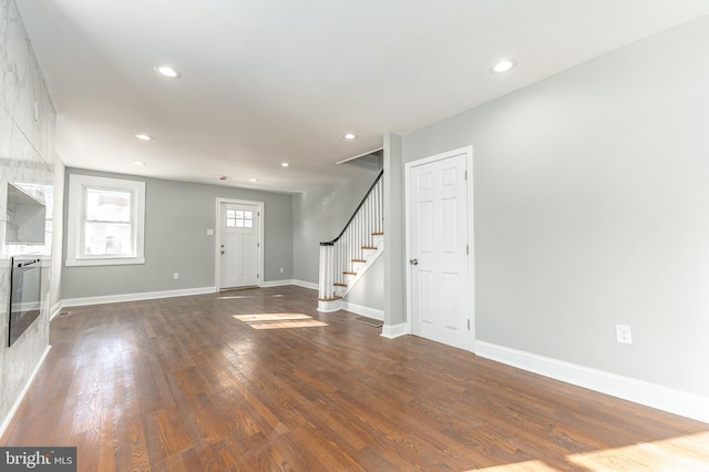 interior space with dark hardwood / wood-style floors