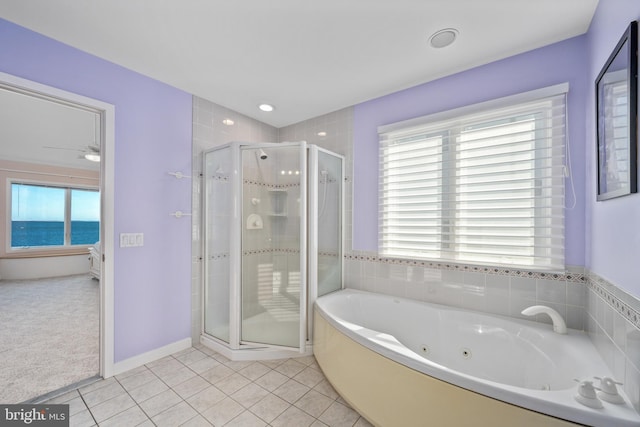 bathroom featuring shower with separate bathtub, tile patterned floors, and plenty of natural light