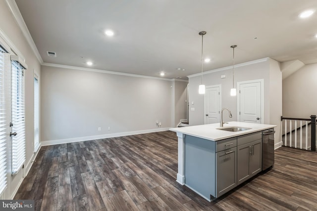 kitchen with a center island with sink, sink, hanging light fixtures, plenty of natural light, and dark hardwood / wood-style flooring