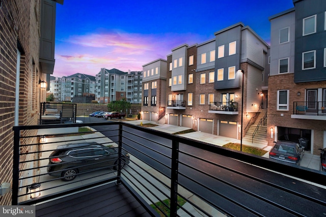 view of balcony at dusk