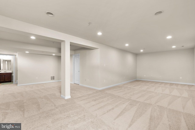 basement with light carpet