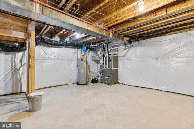 basement with heating unit and electric water heater