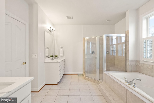 bathroom with separate shower and tub, tile patterned flooring, and vanity