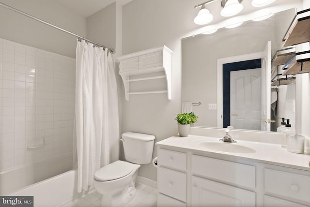 full bathroom featuring tile patterned floors, vanity, toilet, and shower / tub combo