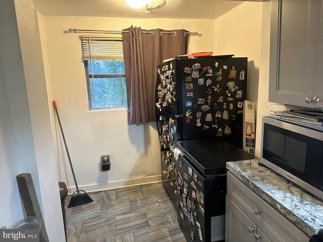 kitchen with gray cabinetry