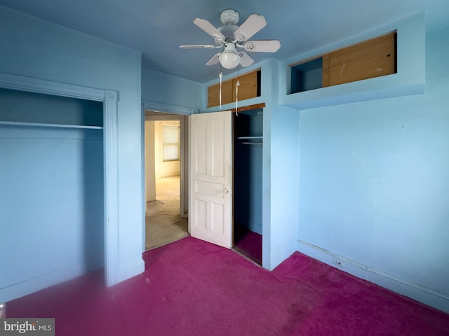 unfurnished bedroom featuring carpet flooring and ceiling fan